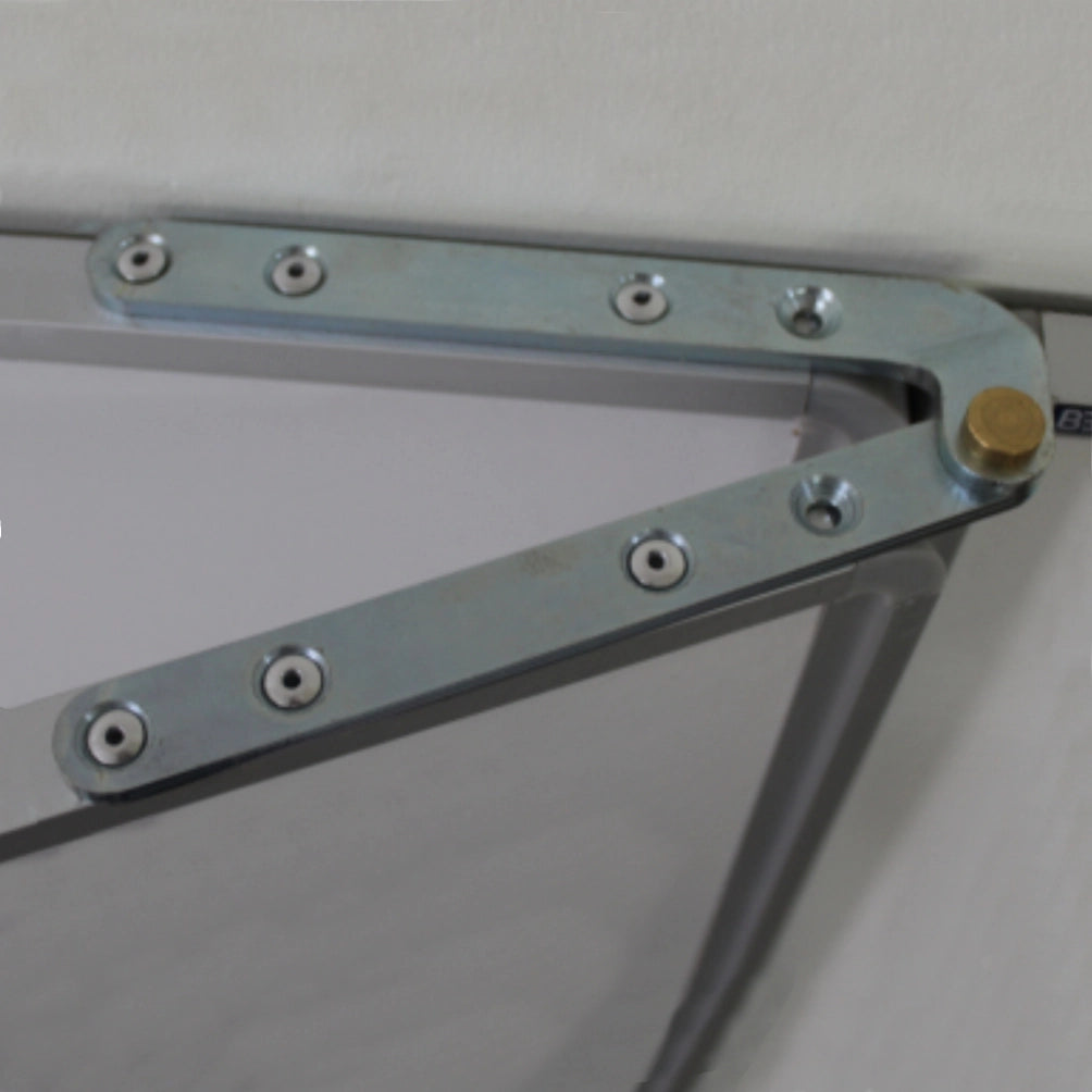 Close-up of a metal frame corner joint with silver-colored steel beams, multiple silver screws, and a brass-colored locking nut, set on a Hinge Whiteboard