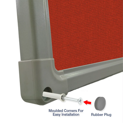Exploded view of a red carpet pin board corner showing the moulded corner piece and rubber plug for easy installation
