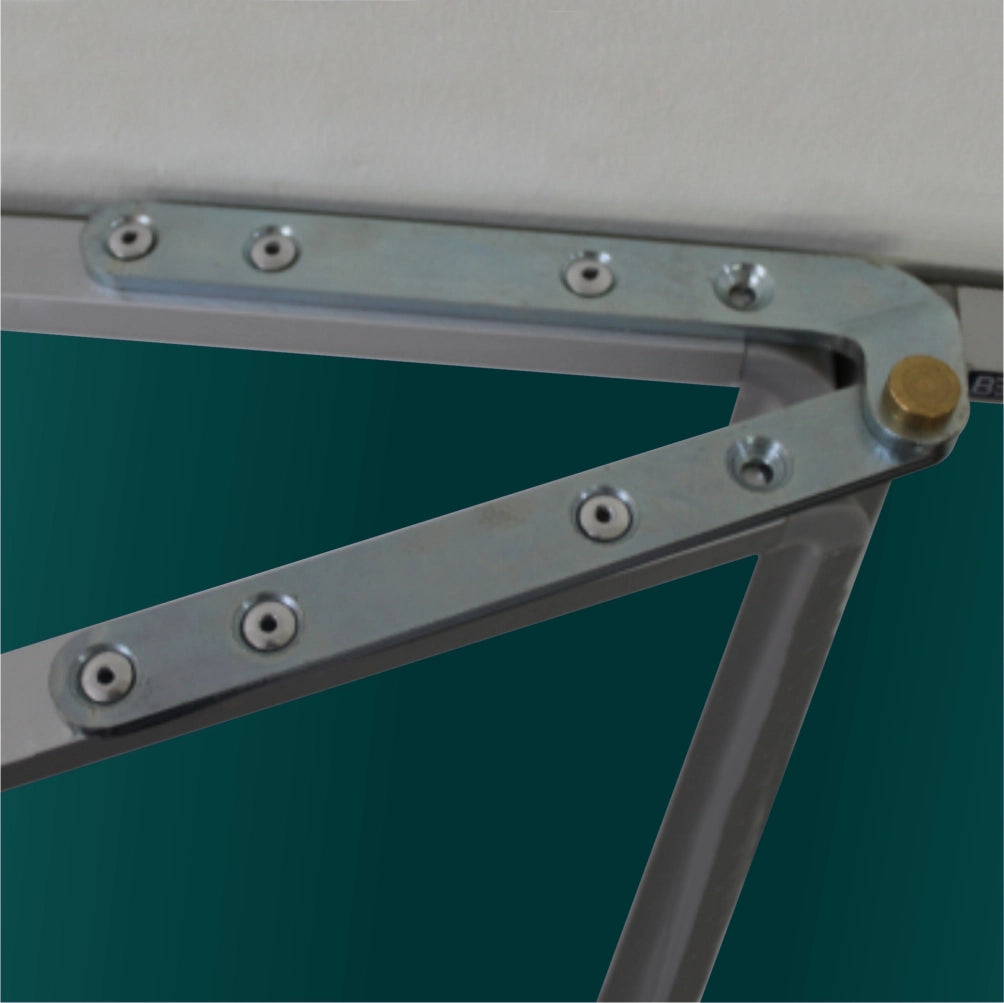 Close-up of a metal frame corner joint with silver-colored steel beams, multiple silver screws, and a brass-colored locking nut, set on a Swing Leaf Chalkboard